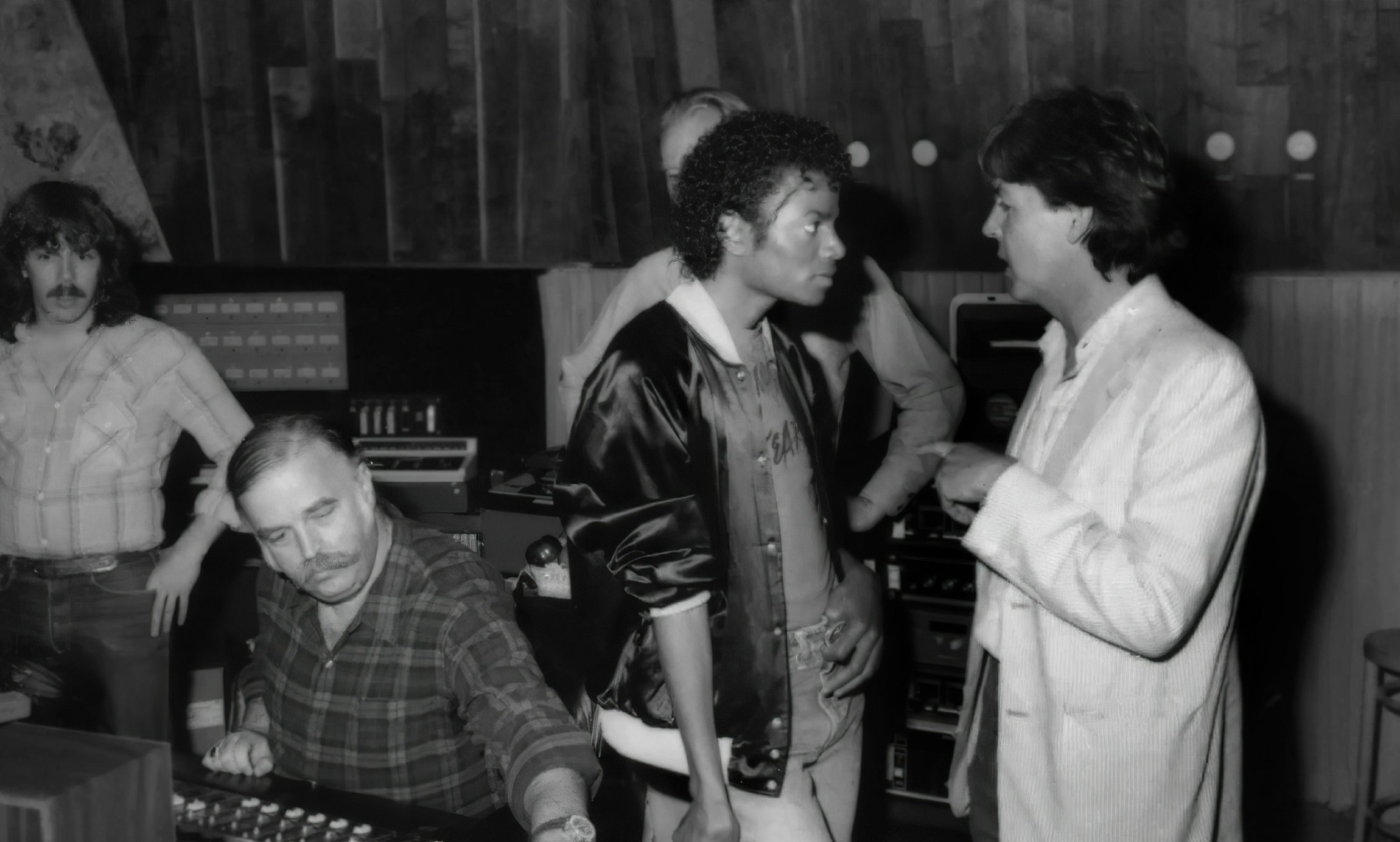 Matt Forger, Bruce Swedien, Sir George Martin (obscured), Michael Jackson, and Sir Paul McCartney during the sessions for “The Girl Is Mine.”